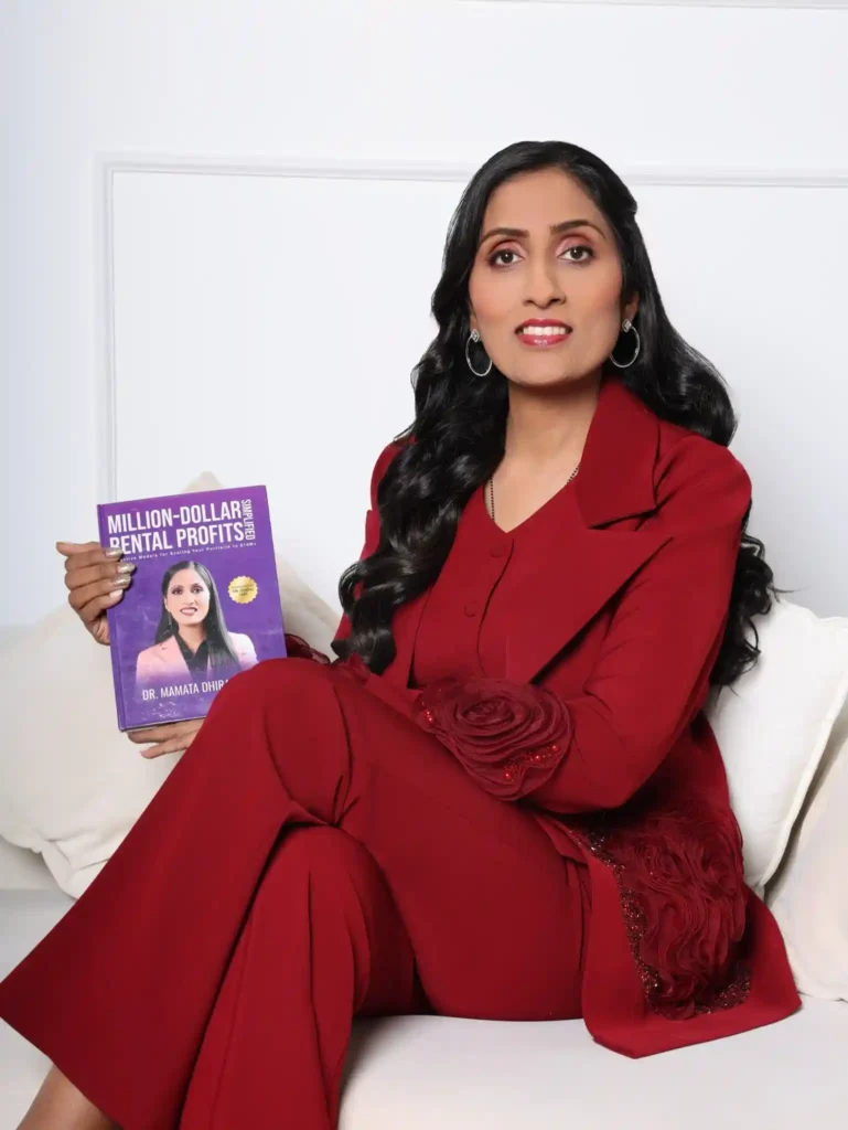 "Mamata Dhiraj Jain with her Dubai real estate investment book Million-Dollar Rental Profits Simplified"