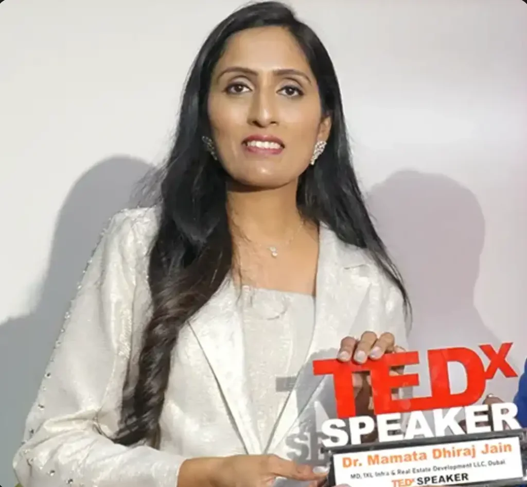 "Mamata Dhiraj Jain holding her TEDx Speaker plaque as MD of 1XL Infra & Real Estate Development, Dubai"